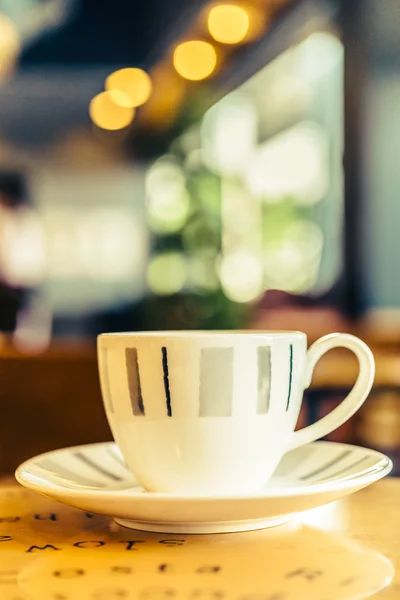 Coffee cup on wooden table — Stock Photo, Image