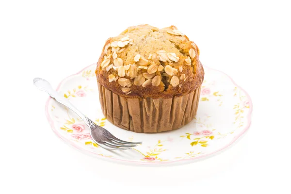 Banana muffin on dish — Stock Photo, Image