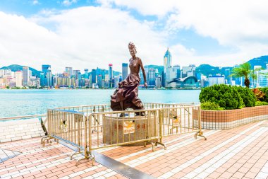 Statue and skyline in Avenue of Stars in Hong Kong clipart