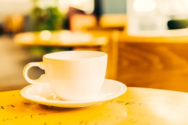 Coffee cup on wooden table — Stock Photo, Image