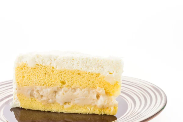 Coconut cake on dish — Stock Photo, Image