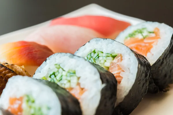 Sushi rolls on white dish — Stock Photo, Image