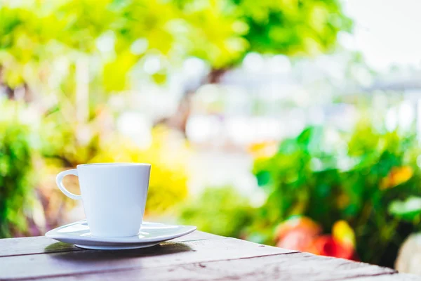 Taza de café sobre mesa de madera —  Fotos de Stock