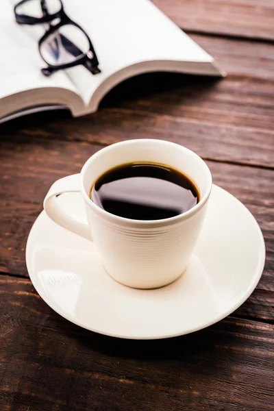 Coffee cup on wooden background Stock Picture