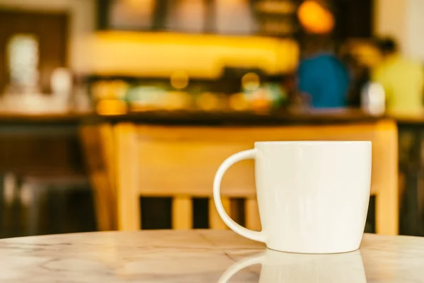 Coffee cup on wooden table — Stock Photo, Image