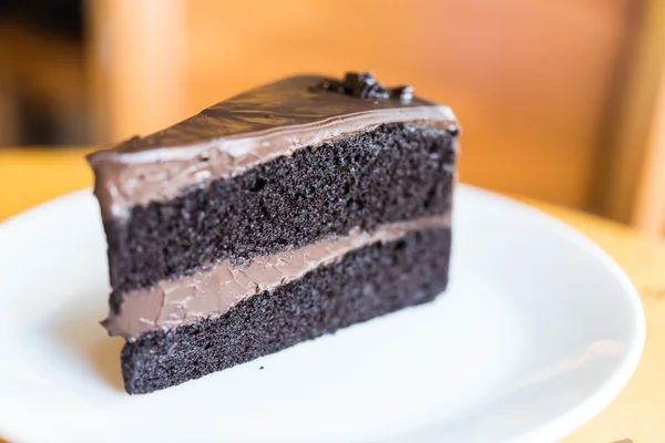 Chocolate cake on white plate — Stock Photo, Image
