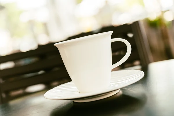 Coffee cup on wooden table — Stock Photo, Image