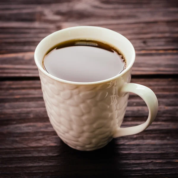 Coffee cup in coffee shop — Stock Photo, Image