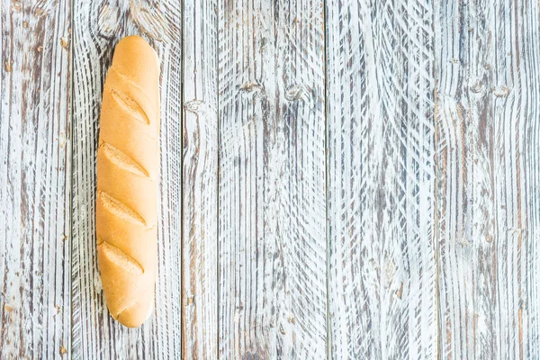 Hanging Bread on wooden wall — Stock Photo, Image