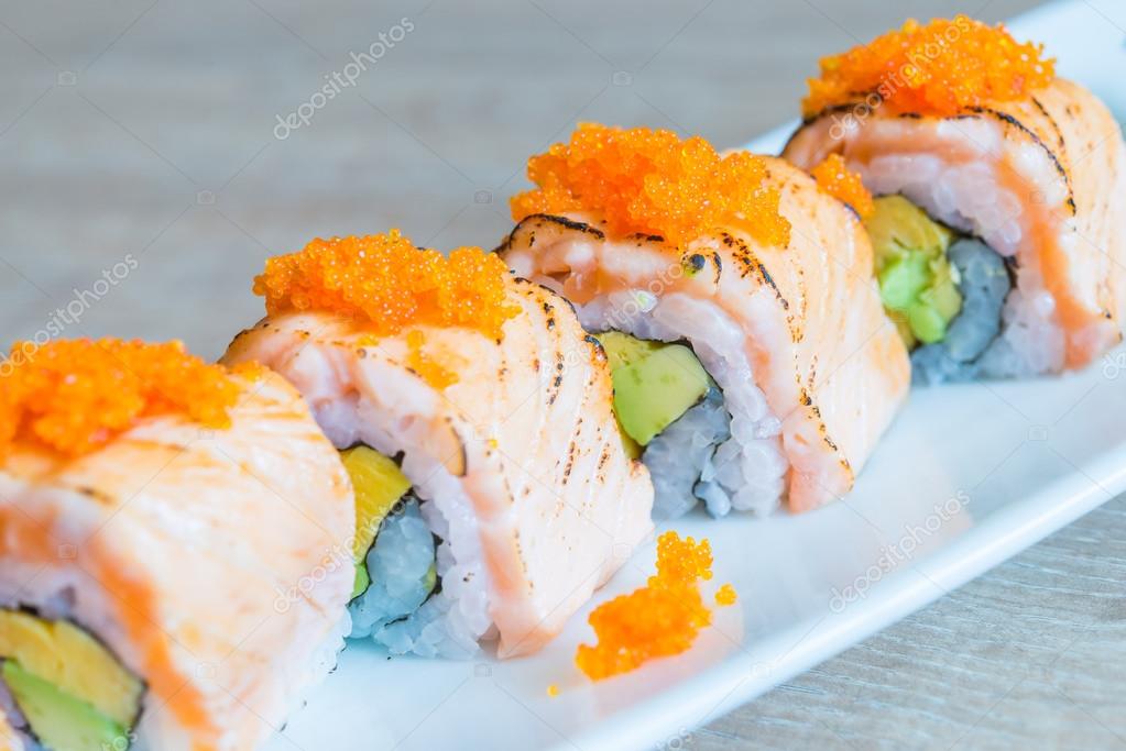 Salmon sushi rolls Stock Photo by ©mrsiraphol 65959641