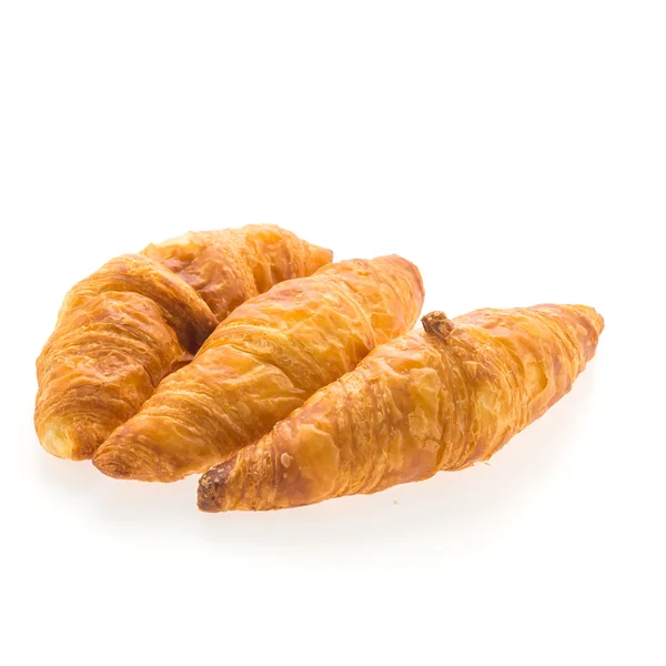 Ízletes barna croissant — Stock Fotó