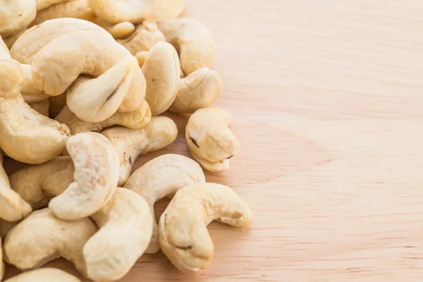 Cashew on wood table — Stock Photo, Image