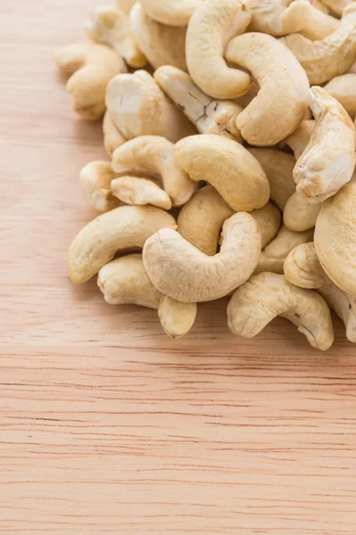 Cashew on wood table — Stock Photo, Image