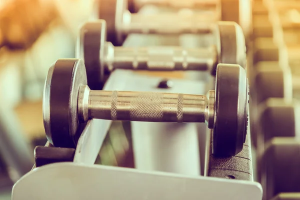 Dumbbells in gym — Stock Photo, Image