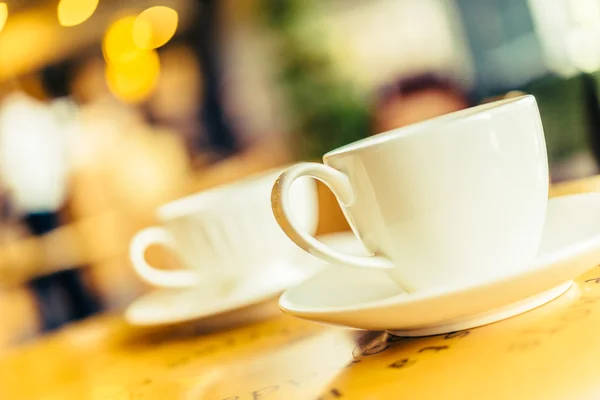 Taza de café sobre mesa de madera —  Fotos de Stock