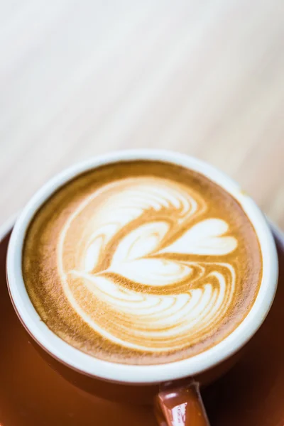 Kaffe kop på træbord - Stock-foto