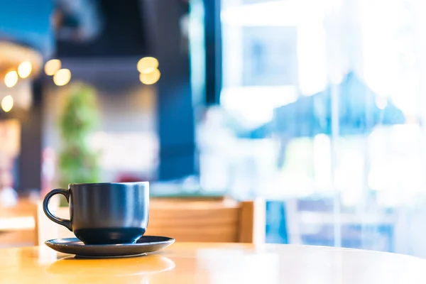 Taza de café sobre mesa de madera —  Fotos de Stock