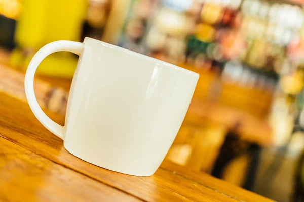 Coffee cup in coffee shop — Stock Photo, Image