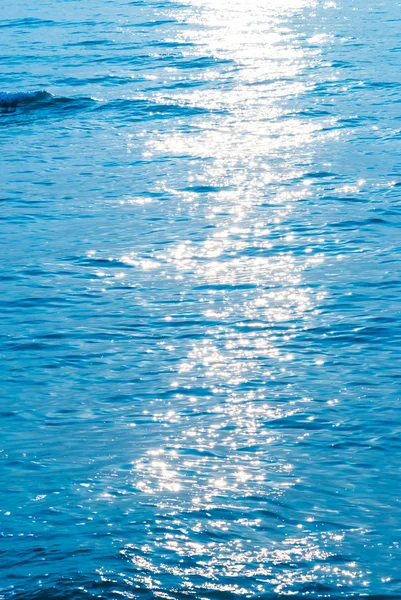 Sea water and sun flare — Stock Photo, Image