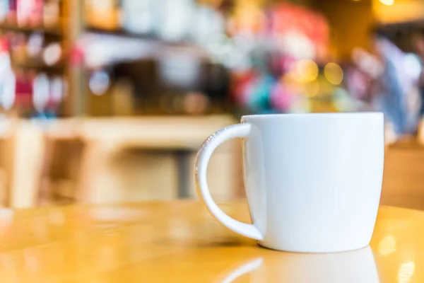 Coffee cup in coffee shop — Stock Photo, Image