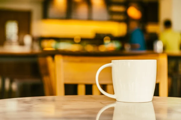 Coffee cup in coffee shop — Stock Photo, Image