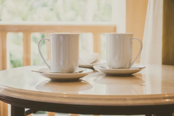 Coffee cup on table — Stock Photo, Image