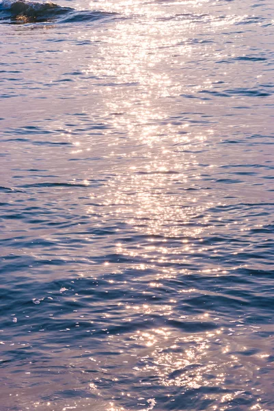 Zee water en zon flare — Stockfoto