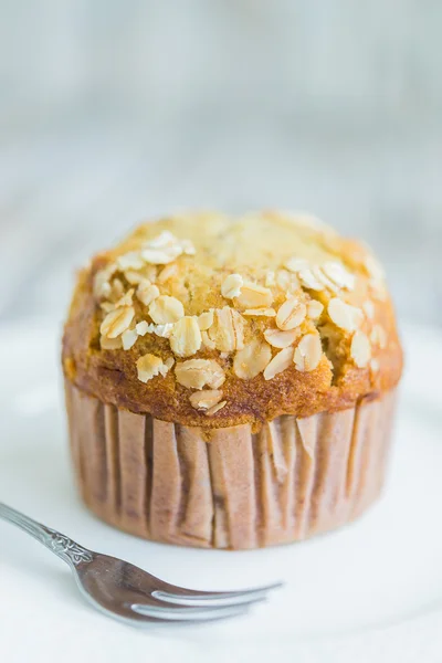 Muffin on wooden table — Stock Photo, Image