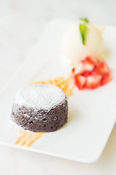 Chocolate lava dessert with ice cream — Stock Fotó