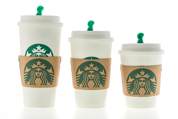 Кофейные чашки Starbucks — стоковое фото