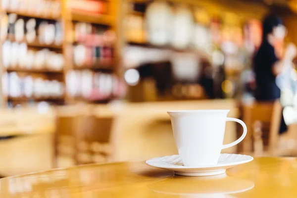 Coffee cup on wood table — Stock Photo, Image