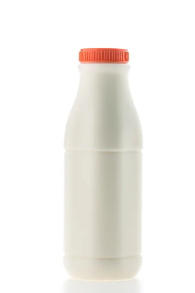 Botella de leche sobre blanco — Foto de Stock