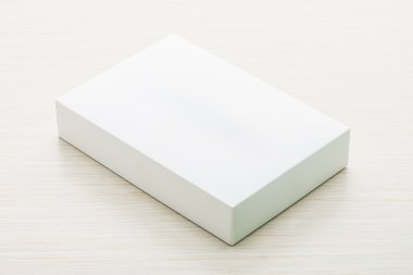 White box mock up on wooden background