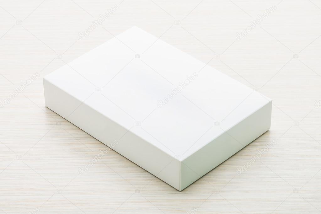 Download White box mock up on wooden background — Stock Photo ...