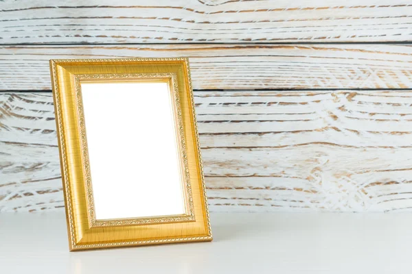 Quadro na mesa de madeira — Fotografia de Stock