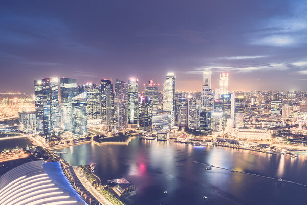 Singapore - July 17, 2015 :Singapore skyline city at night time, vintage filter effect