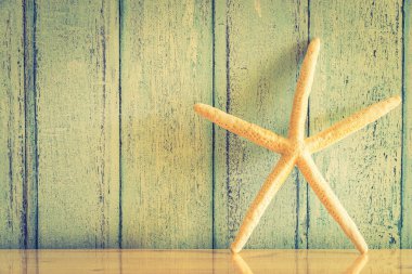 Deniz yıldızı dekorasyon ahşap üzerine