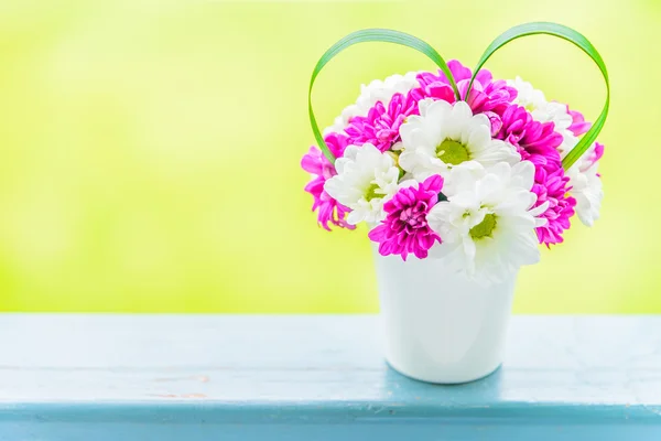 Flowers with love sign — Stock Photo, Image