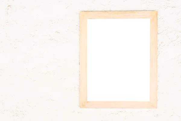 Пустая рамка на белой стене — стоковое фото