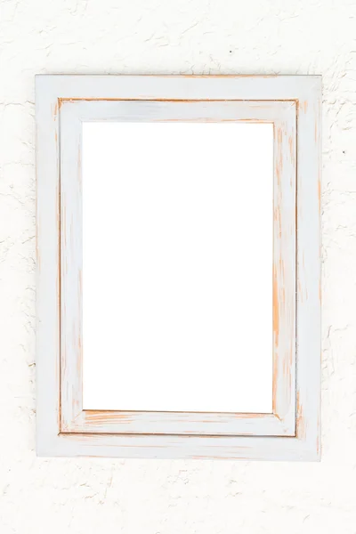 Пустая рамка на белой стене — стоковое фото