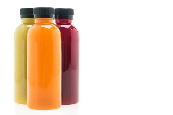 Frutas e garrafas de suco de legumes — Fotografia de Stock