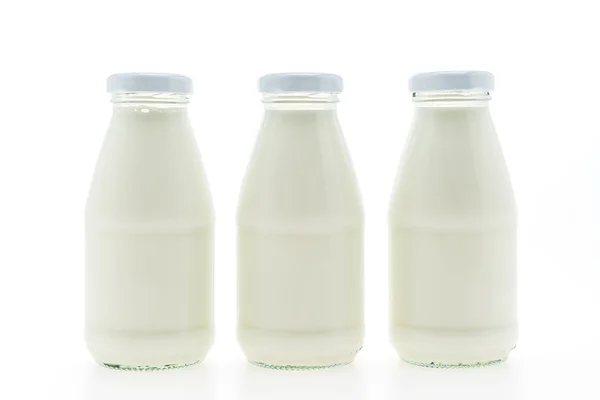 Three Milk bottles — Stok fotoğraf