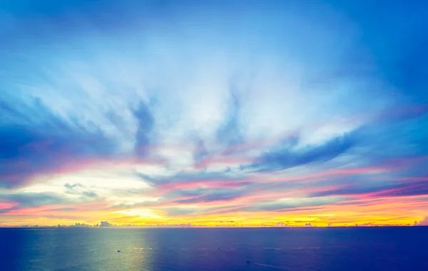 Sunrise with sea and cloudy sky — Stok fotoğraf