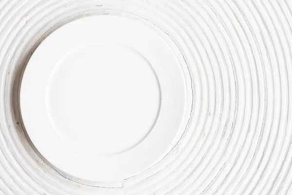 White plate on wood — Stock Photo, Image
