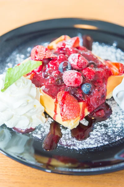 Strawberries and mix of berries with waffle — Stock Photo, Image