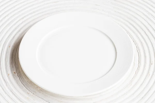 White plate on white wood — Stock Photo, Image