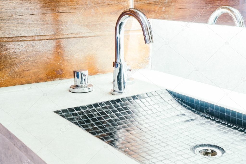 Faucet and sink in bathroom