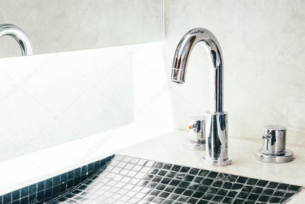 Faucet and sink in bathroom