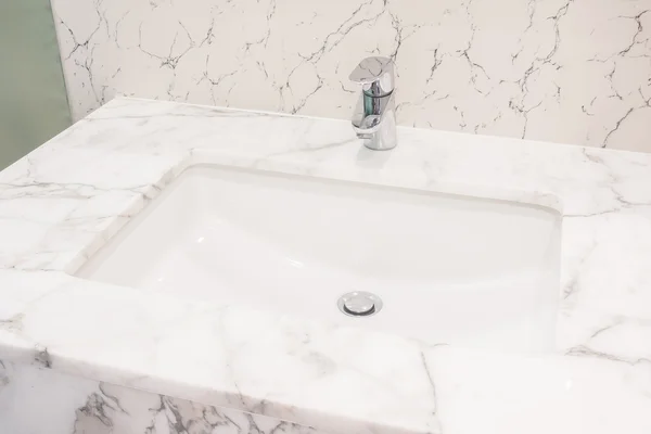 Faucet and sink in bathroom — Stock Photo, Image