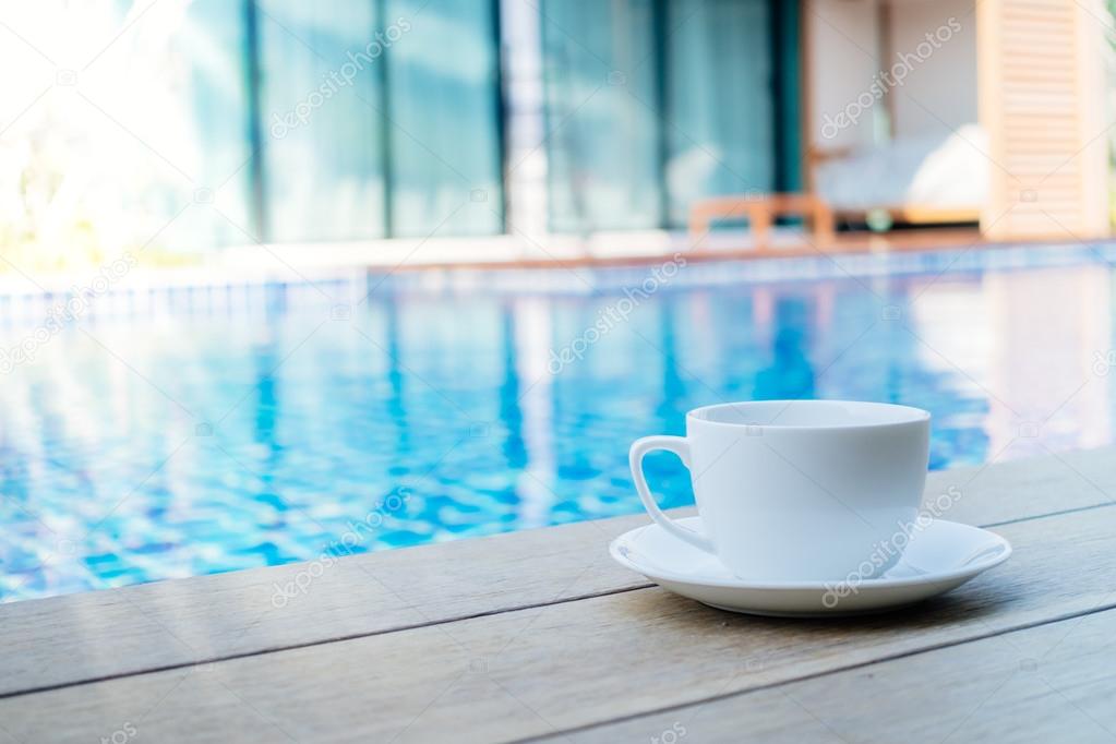 White coffee cup with outdoor view
